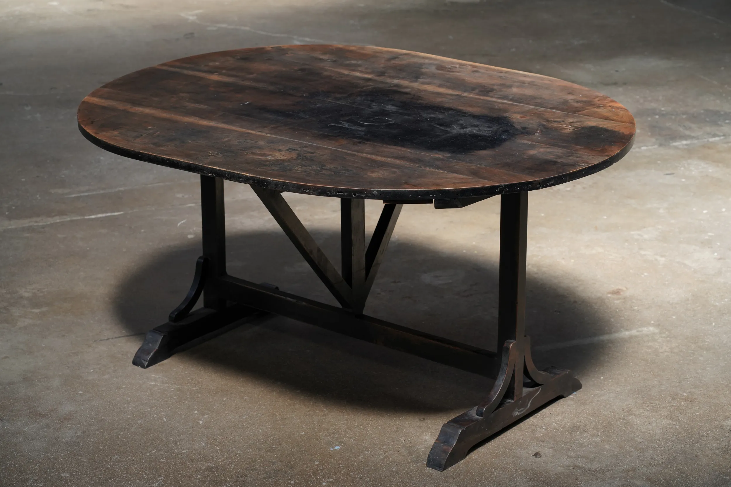 EBONIZED OVAL GATELEG TABLE, ITALY